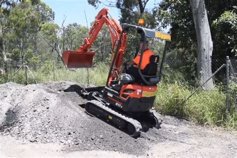 mini excavator climbing wall|climbing hills with an excavator.